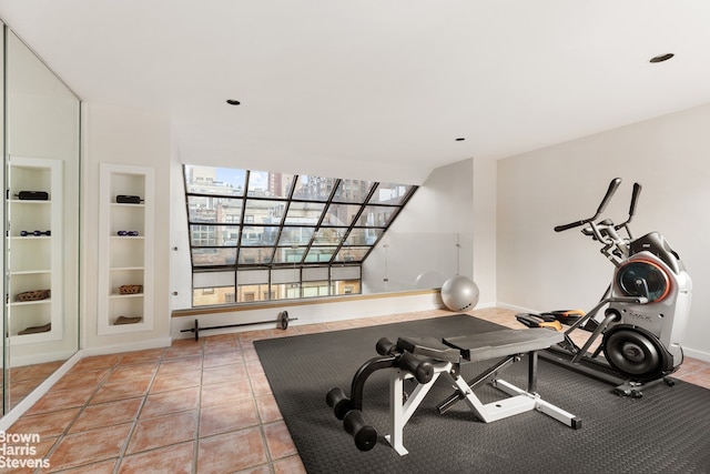 exercise area with built in features and baseboards
