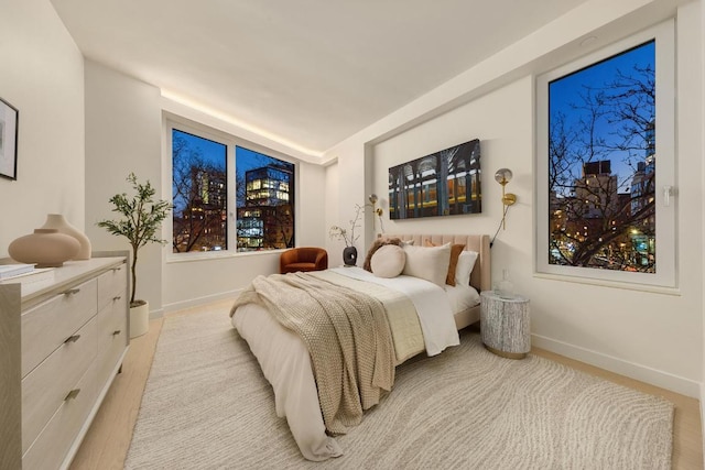 bedroom featuring light wood-type flooring