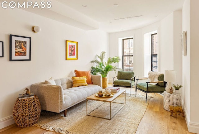 living area with wood-type flooring