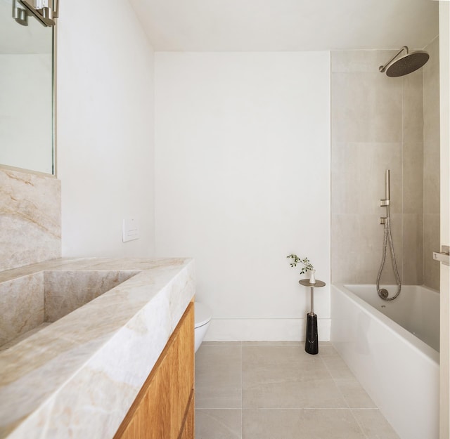 bathroom with a shower, a tub to relax in, toilet, vanity, and tile patterned floors