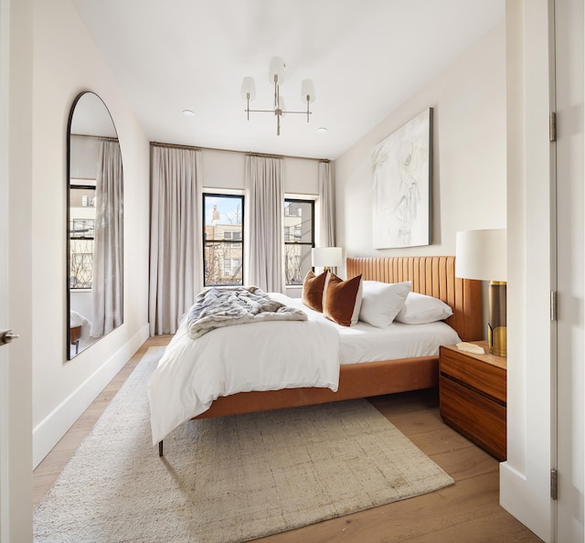 bedroom featuring light wood-type flooring