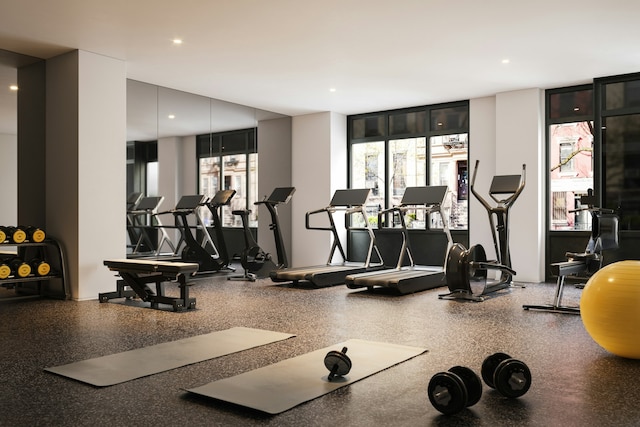 workout area featuring recessed lighting