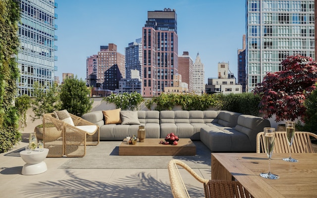 exterior space featuring a city view and an outdoor living space