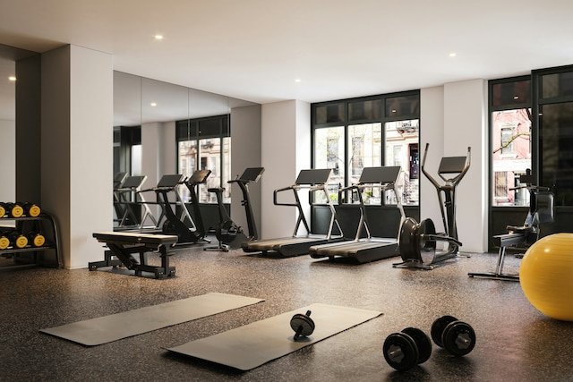 244 E 52nd St Unit 3C, New York City, NY 10022 - gym featuring recessed lighting