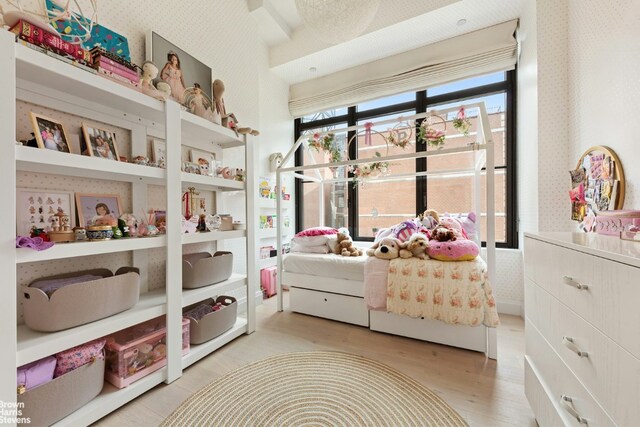 bedroom with light hardwood / wood-style floors