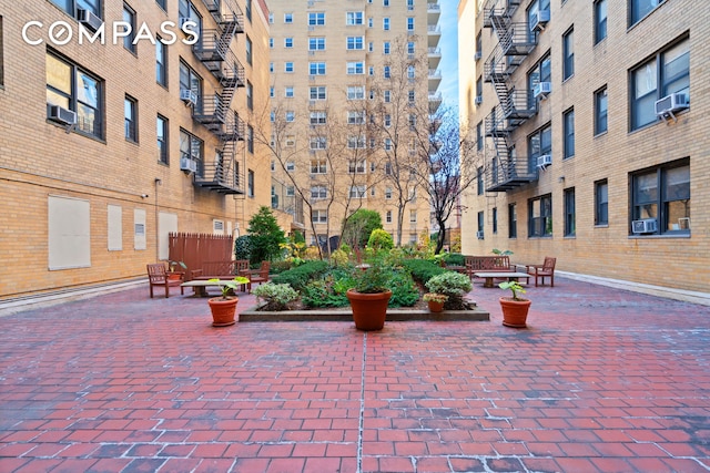 surrounding community featuring a fire pit