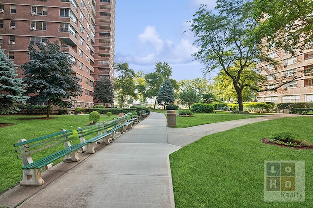 view of home's community featuring a yard