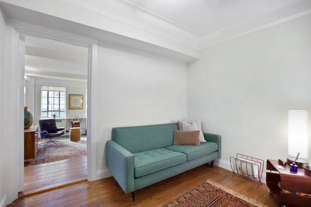 living area featuring hardwood / wood-style floors