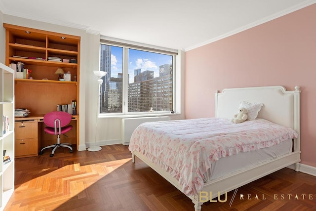 bedroom with ornamental molding, radiator heating unit, and parquet flooring