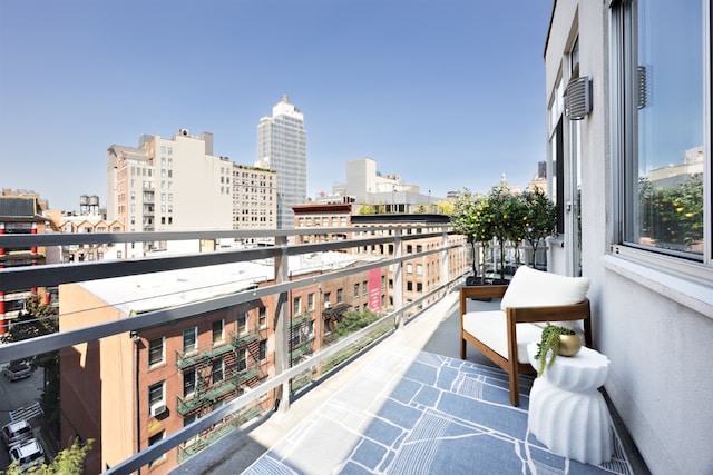 balcony featuring a city view