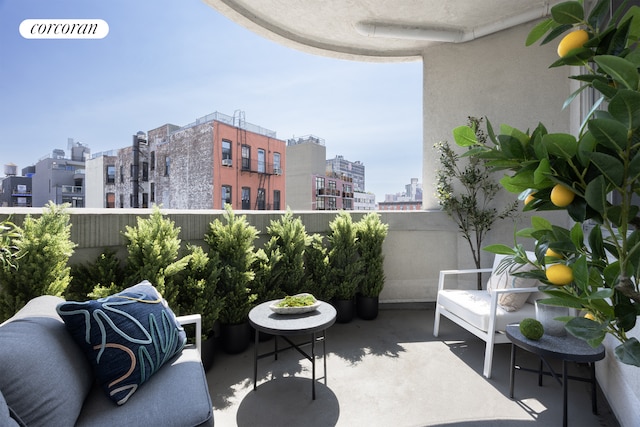 balcony featuring a city view