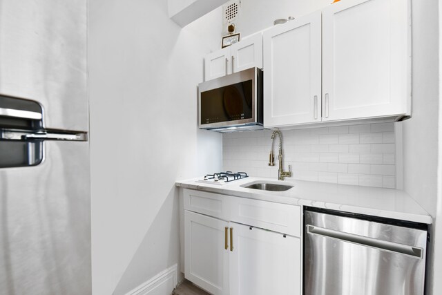 living room with sink and dark parquet flooring