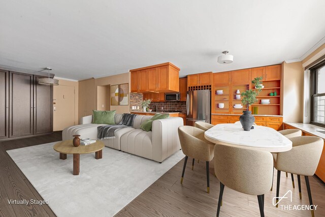 bedroom featuring ceiling fan and crown molding