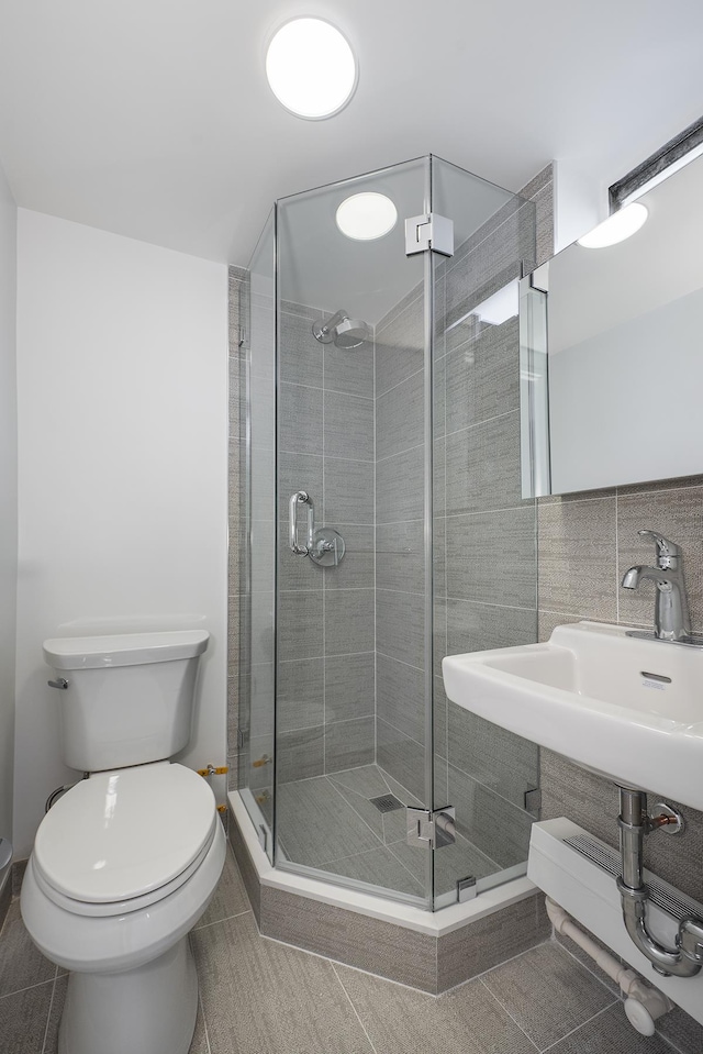 240 E 76th St Unit 7-M, New York City, NY 10021 - full bath with toilet and a stall shower