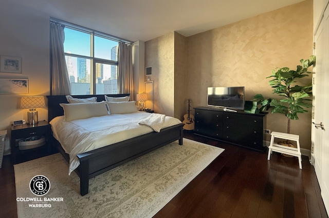 bedroom with wood finished floors