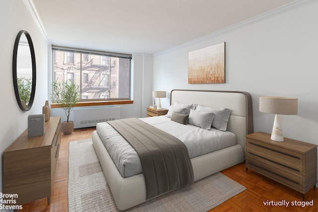 bedroom with radiator heating unit, ornamental molding, and light parquet floors