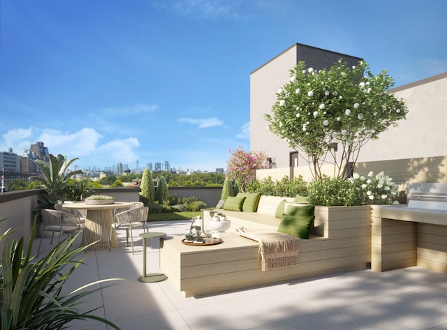 view of patio / terrace featuring exterior kitchen and an outdoor hangout area