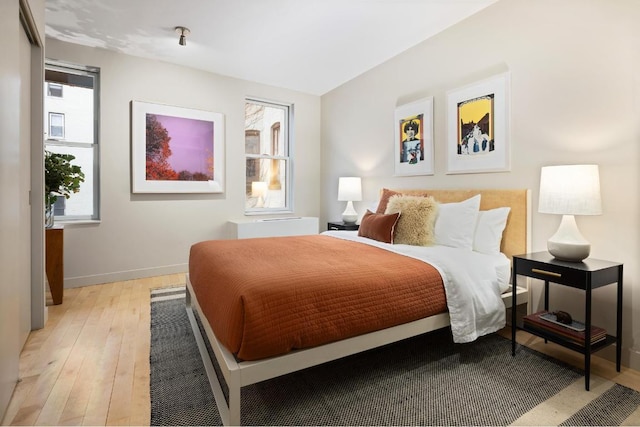 bedroom with light wood-type flooring