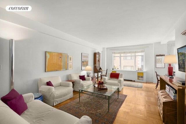 living room featuring light parquet flooring