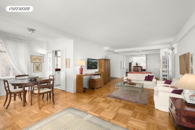 living room featuring light parquet floors