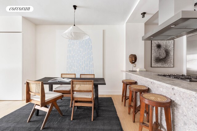 dining area featuring light hardwood / wood-style flooring