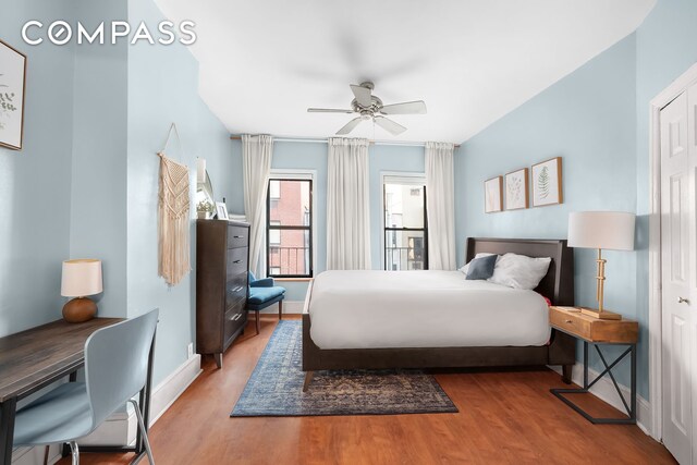 bedroom featuring ceiling fan and light hardwood / wood-style flooring