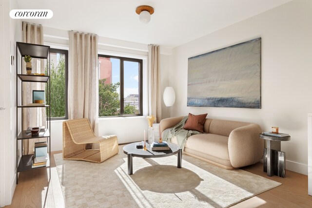 living area featuring hardwood / wood-style floors