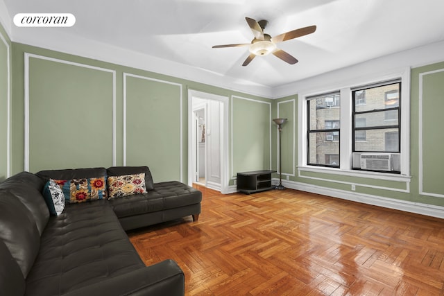 living room with light parquet floors, cooling unit, and ceiling fan