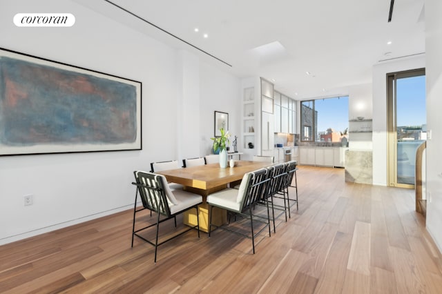 dining area featuring light hardwood / wood-style floors