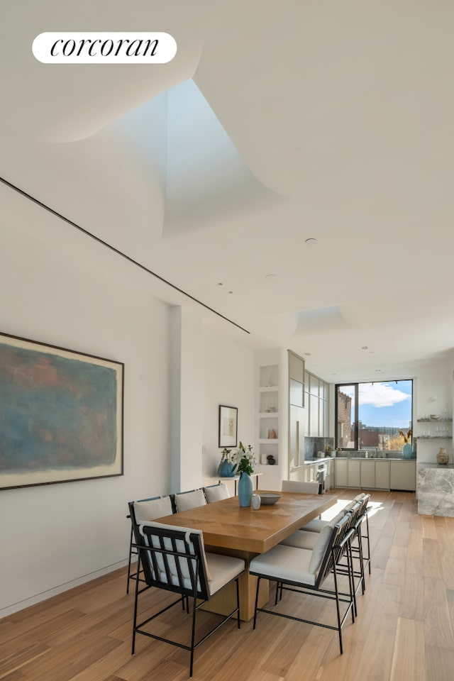 68 Commercial St Ph, Ph, New York City, NY 11222 - dining area with light wood-style floors and built in features