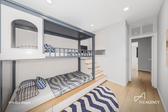 bedroom featuring light hardwood / wood-style floors