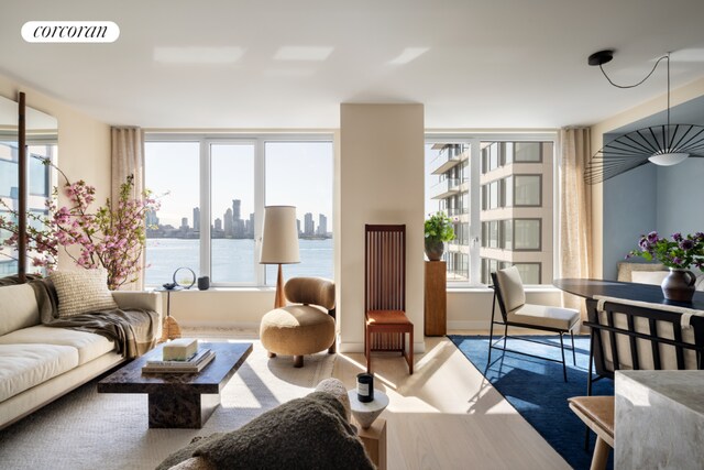 living room featuring a water view