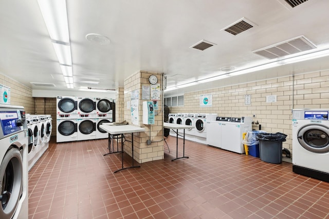 205 3rd Ave Unit 11T, New York City, NY 10003 - community laundry with stacked washer and clothes dryer and washing machine and dryer