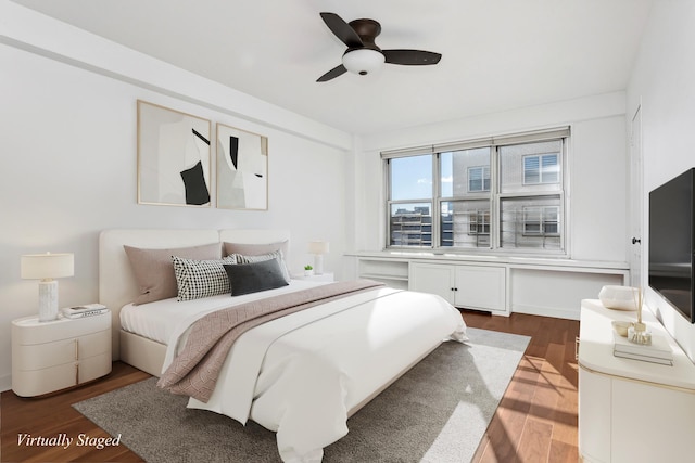 bedroom featuring ceiling fan and wood finished floors