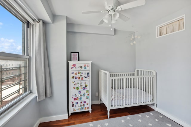 205 3rd Ave Unit 11T, New York City, NY 10003 - bedroom featuring wood finished floors, a nursery area, and ceiling fan