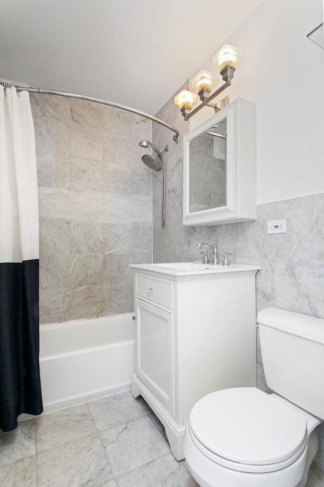205 3rd Ave Unit 11T, New York City, NY 10003 - bathroom featuring shower / bath combo with shower curtain, toilet, a chandelier, vanity, and marble finish flooring