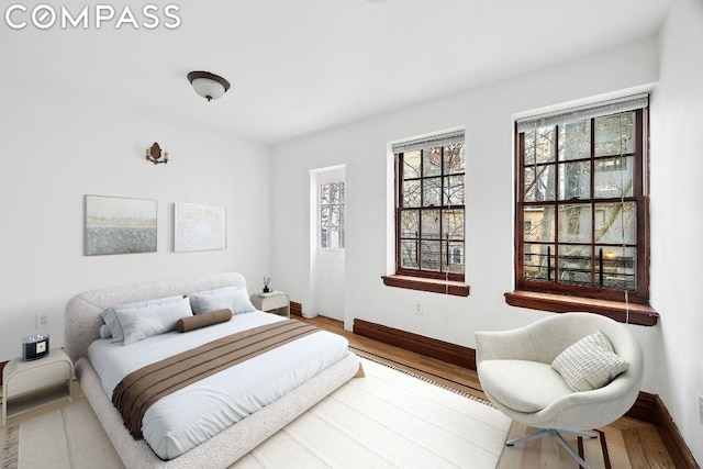 bedroom featuring hardwood / wood-style flooring