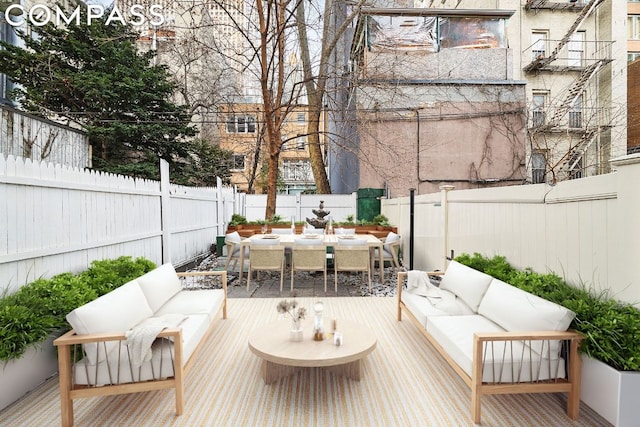 wooden deck featuring an outdoor living space