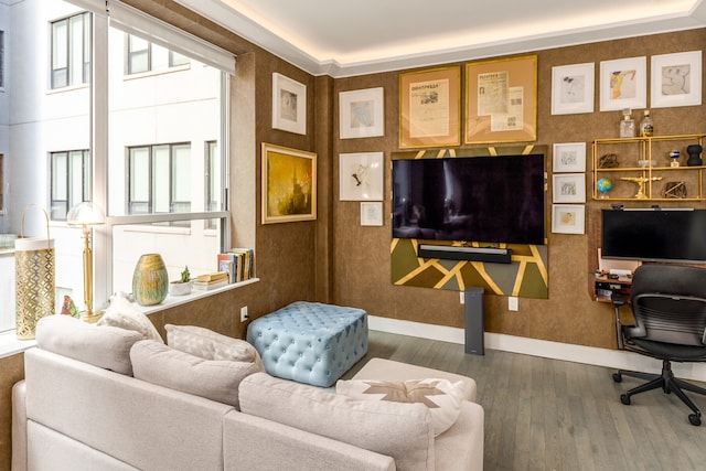 living room featuring wood finished floors and baseboards