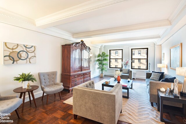 living room featuring crown molding and dark parquet floors