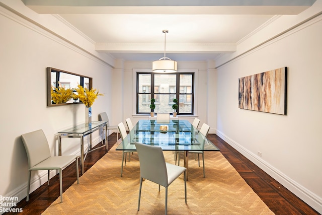 dining space with dark parquet flooring, ornamental molding, and beamed ceiling