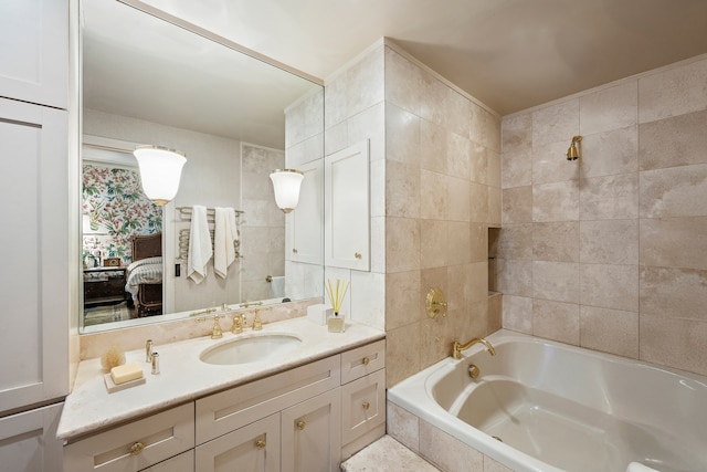 bathroom featuring connected bathroom, vanity, shower / bathtub combination, and tile walls