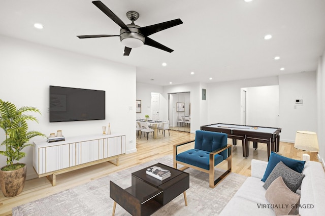 living area featuring light wood-style flooring, recessed lighting, pool table, and a ceiling fan