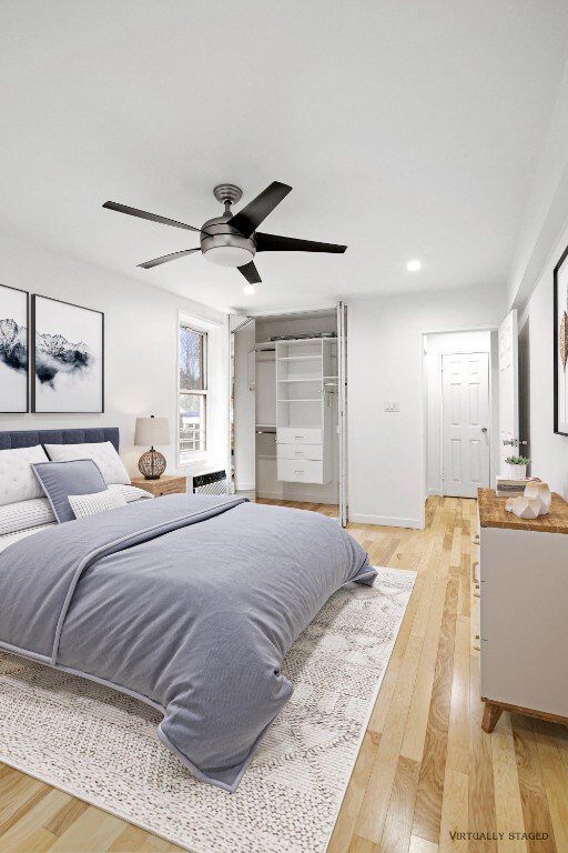 bedroom with baseboards, recessed lighting, light wood-style floors, and a ceiling fan