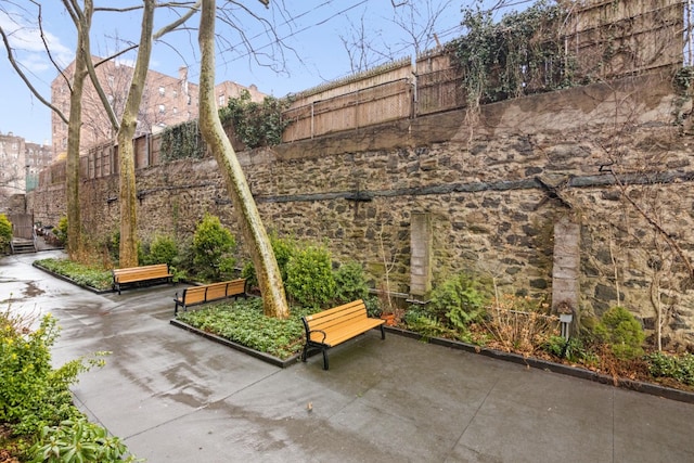 surrounding community with a patio and a fenced backyard