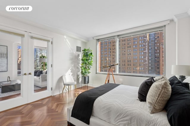 bedroom featuring visible vents, access to outside, and french doors