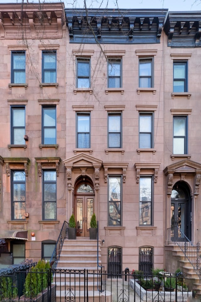 464 5th St, New York City, NY 11215 - view of front of home with french doors and a fenced front yard
