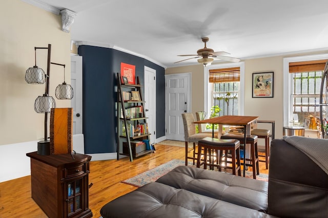 464 5th St, New York City, NY 11215 - living area featuring crown molding, ceiling fan, and wood finished floors
