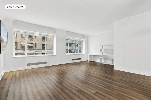 unfurnished living room featuring crown molding and dark hardwood / wood-style floors