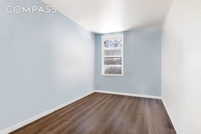 spare room featuring light hardwood / wood-style flooring